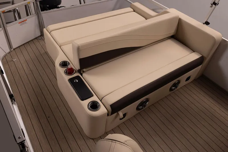 Slide: The Image of Manufacturer Provided Image: Luxurious seating on 2026 SunCatcher Fusion 324SL boat, featuring beige upholstery and cup holders. - 16