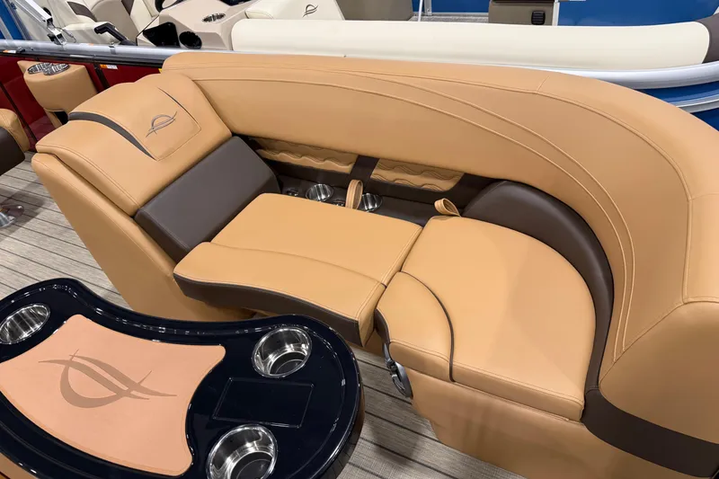 Slide: The Image of Luxurious seating on 2026 SunCatcher Fusion 324SL boat with cup holders and elegant design. - 2