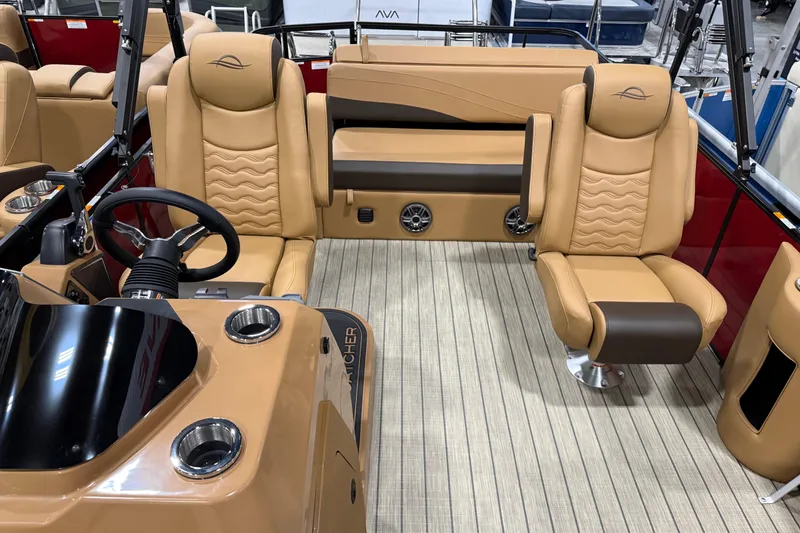 Slide: The Image of Luxurious interior of 2026 SunCatcher Fusion 324SL boat with tan leather seating. - 4