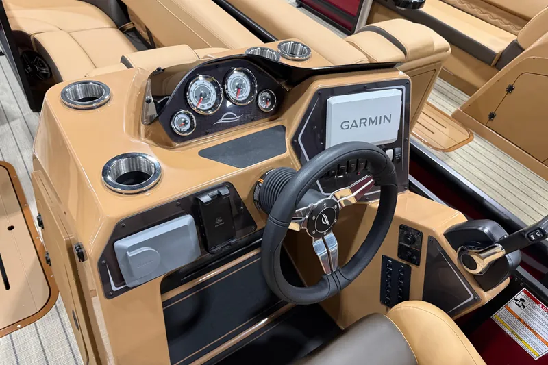 Slide: The Image of Interior view of 2026 SunCatcher Fusion 324SL boat dashboard with Garmin navigation system. - 6