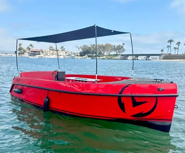 The Image of 2023 Vision Marine Technologies Volt 180 boat on water, featuring a sleek red design. - 0