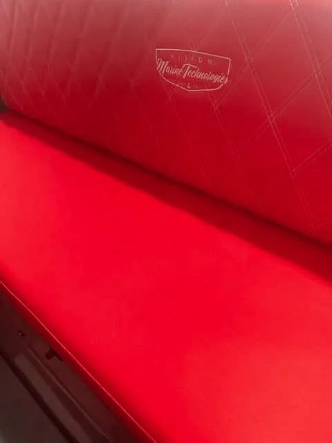 Slide: The Image of Red seat upholstery of 2023 Vision Marine Technologies Volt 180 boat. - 6