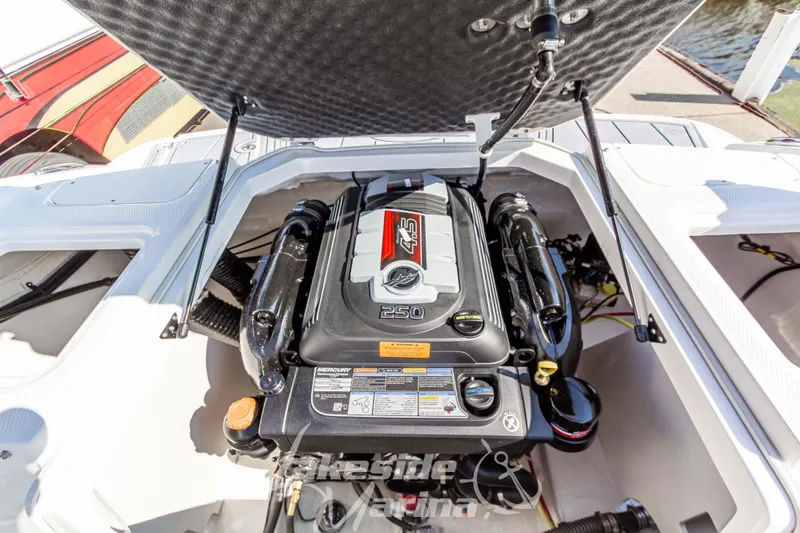 Slide: The Image of 2025 Chaparral 21 SSi Ski & Fish boat engine compartment with Mercury 4.5L 250 HP engine. - 18
