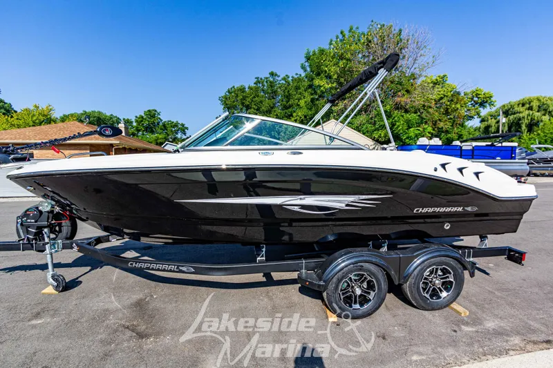 Slide: The Image of 2025 Chaparral 21 SSi Ski & Fish boat on trailer at Lakeside Marina. - 2