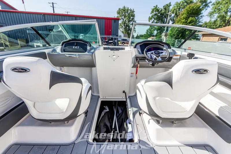 Slide: The Image of 2025 Chaparral 21 SSi Ski & Fish boat interior with dual seats and dashboard view. - 20