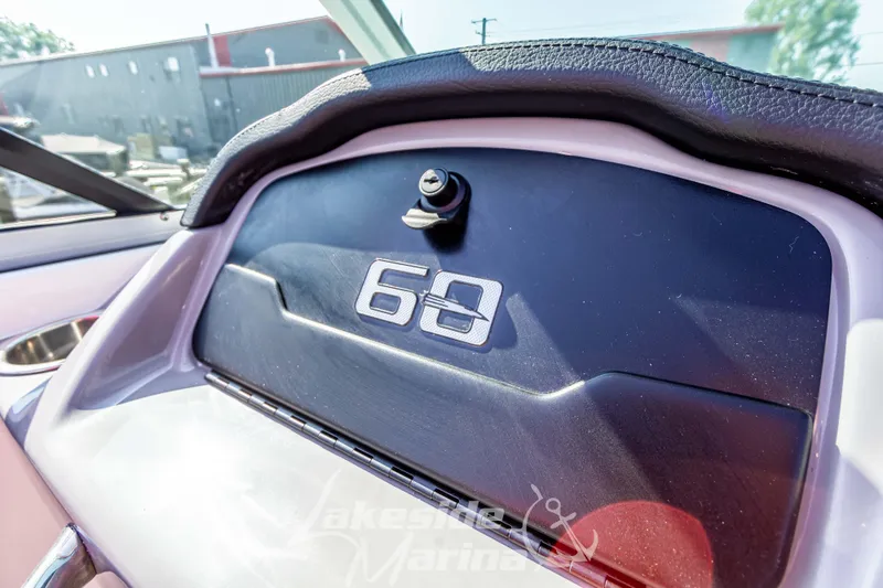 Slide: The Image of Dashboard of 2025 Chaparral 21 SSi Ski & Fish boat with "60" emblem. - 24