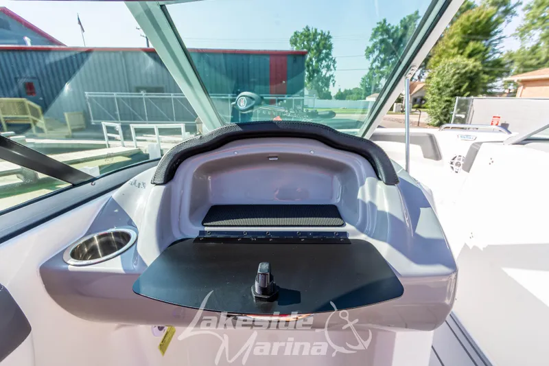 Slide: The Image of Interior view of 2025 Chaparral 21 SSi Ski & Fish boat dashboard at Lakeside Marina. - 25