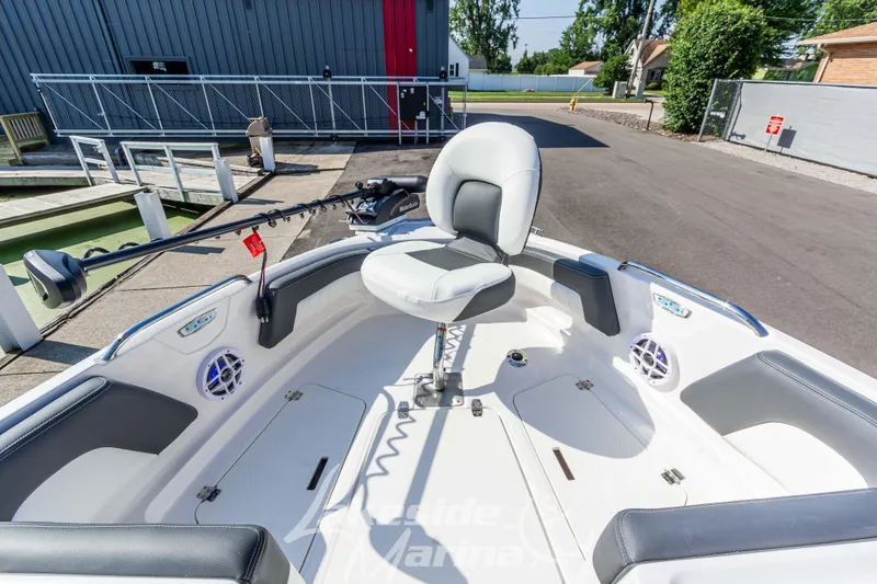Slide: The Image of 2025 Chaparral 21 SSi Ski & Fish boat interior with seating and fishing equipment. - 31