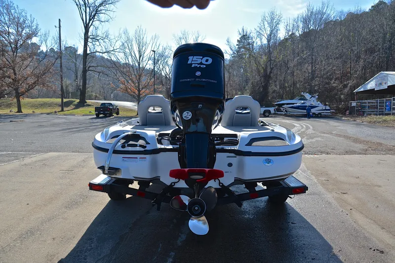Slide: The Image of 2018 Nitro Z18 Pro boat with 150 Pro motor in a scenic outdoor setting. - 13