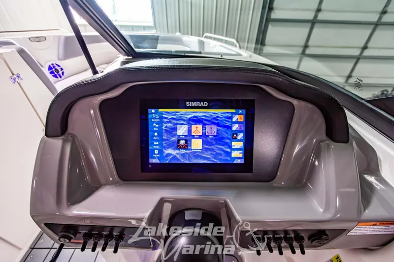Slide: The Image of Dashboard of 2025 Chaparral 23 SSi boat with Simrad navigation system. - 22