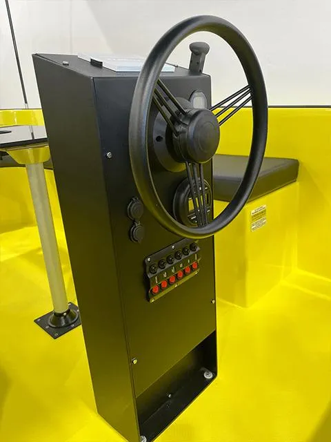 Slide: The Image of 2023 Vision Marine Technologies Volt 180 steering console with control panel on yellow deck. - 3