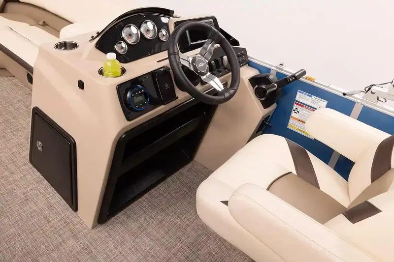 Slide: The Image of Manufacturer Provided Image: Interior of 2026 SunCatcher Select 20C boat with steering wheel and control panel. - 11