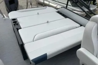 Slide: The Image of 2026 Sweetwater 2286SFLC boat with adjustable seating and cup holders. - 10