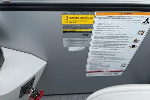 Slide: The Image of 2026 Sweetwater 2286SFLC boat capacity label, maximum 13 persons or 1800 lbs. - 22