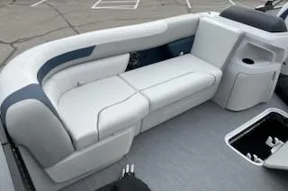 Slide: The Image of Luxurious seating on 2026 Sweetwater 2286SFLC boat, featuring sleek design and ample storage. - 7