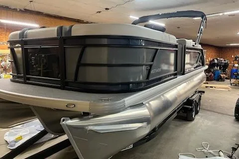 The Image of 2026 Sweetwater 2286SFL pontoon boat in a garage setting. - 0