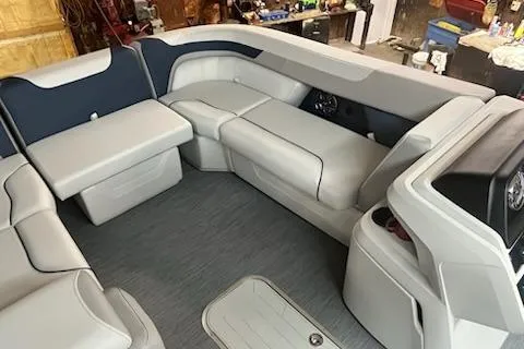 Slide: The Image of 2026 Sweetwater 2286SFL boat interior with modern seating and sleek design. - 2