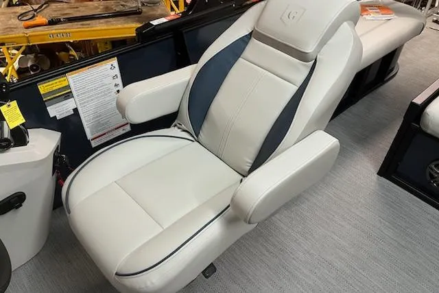 Slide: The Image of Luxurious seating on 2026 Sweetwater 2286SFL boat, featuring plush white upholstery. - 20