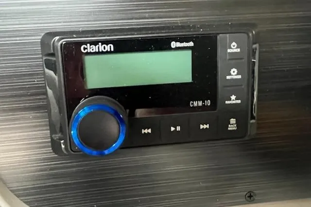 Slide: The Image of Clarion CMM-10 Bluetooth stereo system in 2026 Sweetwater 2286SFL boat. - 4