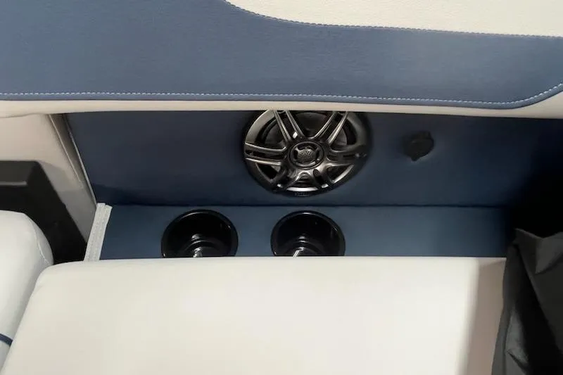 Slide: The Image of 2026 Sweetwater 2286SFL boat interior with speaker and cup holders. - 5