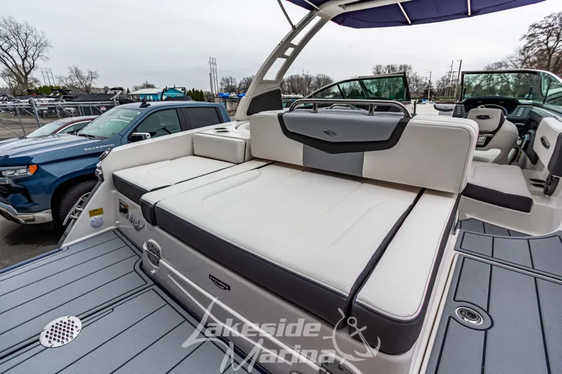 Slide: The Image of 2025 Chaparral 247 SSX boat with spacious seating and modern design at Lakeside Marina. - 10
