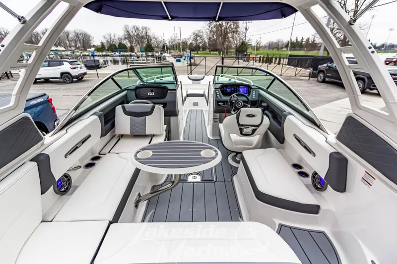 Slide: The Image of 2025 Chaparral 247 SSX boat interior with modern seating and sleek design. - 30