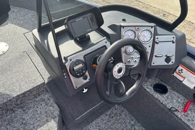 Slide: The Image of Interior view of 2025 Tracker Pro Guide V-175 WT helm. - 13