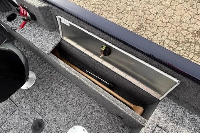 Slide: The Image of Interior view of 2025 Tracker Pro Guide V-175 WT with storage compartment. - 21