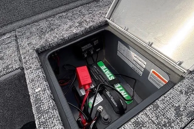 Slide: The Image of Battery compartment of the 2025 Tracker Pro Guide V-175 WT boat model. - 26