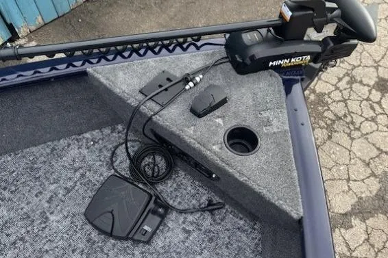 Slide: The Image of 2025 Tracker Pro Guide V-175 WT boat with Minn Kota trolling motor on deck. - 7