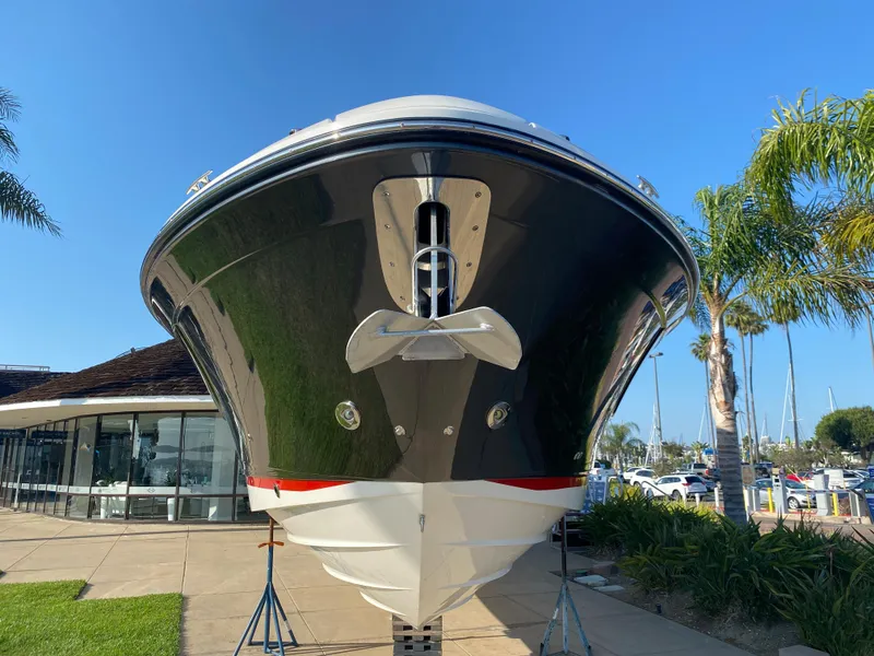 Slide: The Image of 2021 Sea Ray SLX 400 Outboard, front view, clear blue sky. - 4