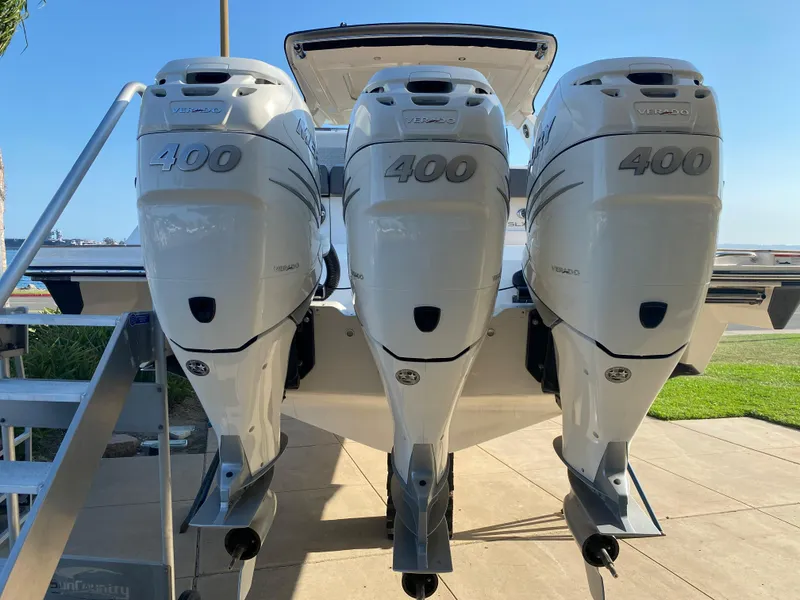 Slide: The Image of Three outboard engines of a 2021 Sea Ray SLX 400. - 5