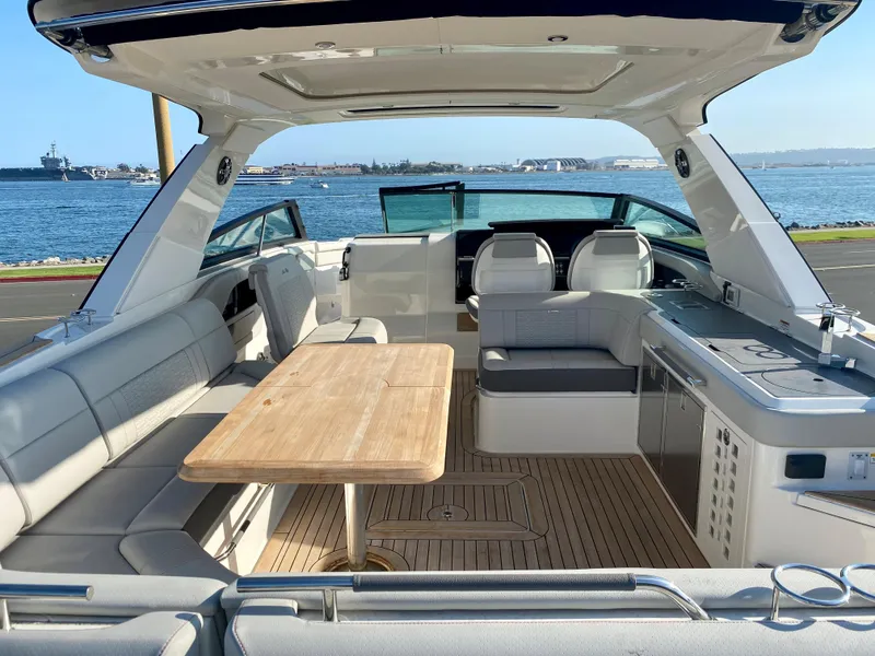 Slide: The Image of Interior of a 2021 Sea Ray SLX 400 Outboard yacht by the water. - 7