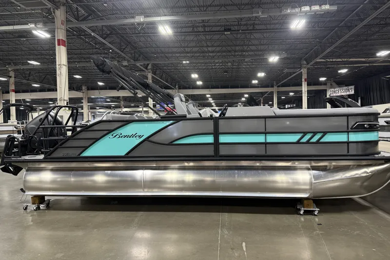 The Image of 2026 Bentley Pontoons 223 Swingback Dual Capt pontoon boat in showroom. - 0