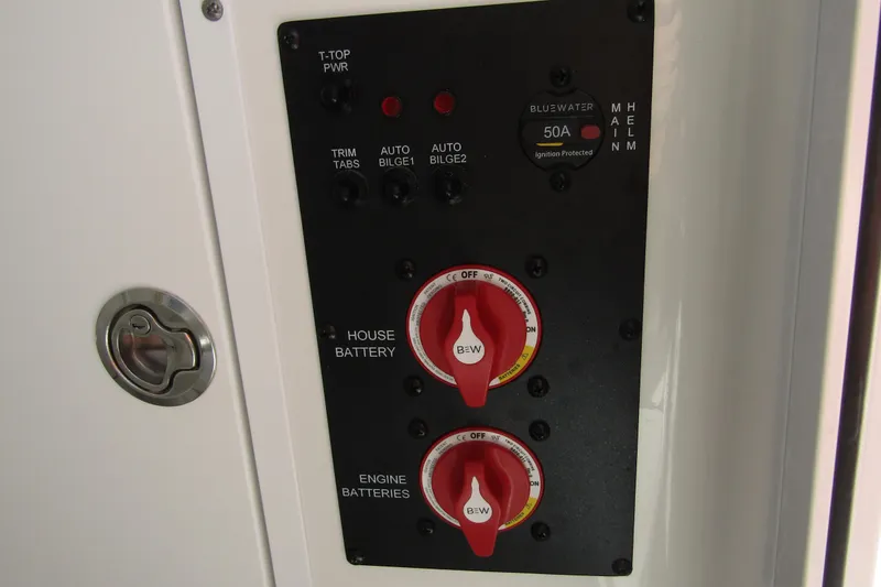 Slide: The Image of Control panel of 2025 Sea Hunt Ultra 275 SE boat with battery switches. - 20