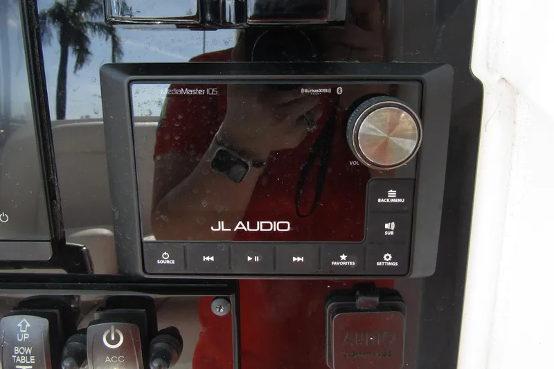 Slide: The Image of JL Audio MediaMaster 105 on 2025 Sea Hunt Ultra 275 SE boat dashboard. - 27
