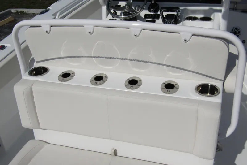 Slide: The Image of 2025 Sea Hunt Ultra 275 SE boat seating with integrated cup holders and sleek design. - 44