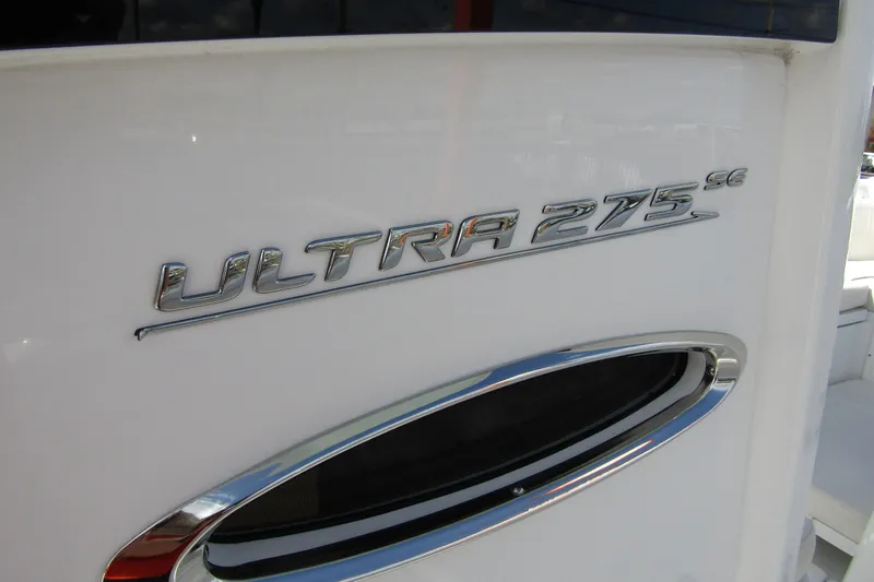 Slide: The Image of 2025 Sea Hunt Ultra 275 SE boat emblem on white surface. - 8