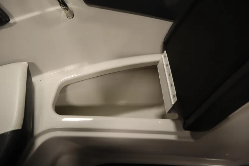 Slide: The Image of Interior storage compartment of 2018 Four Winns H190 boat. - 16