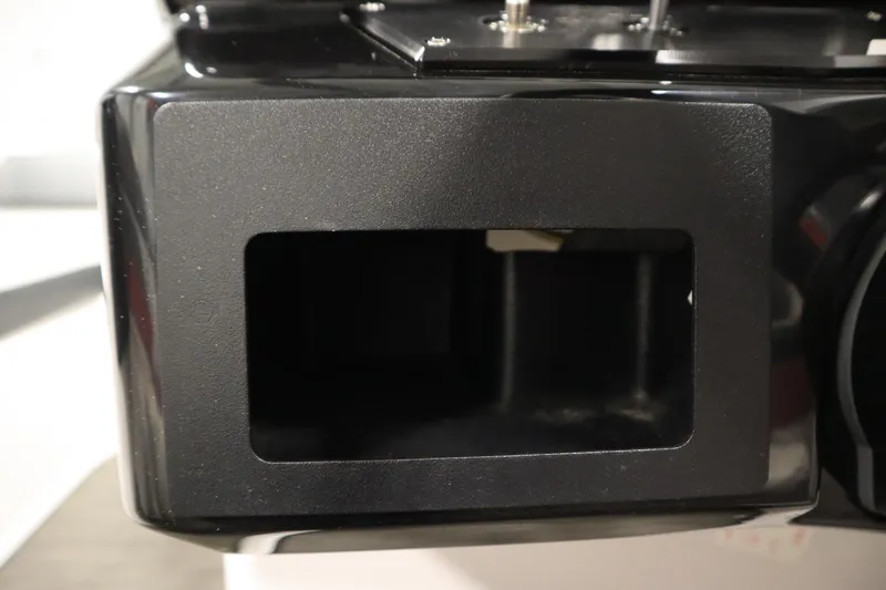 Slide: The Image of Close-up of a 2018 Four Winns H190 boat dashboard compartment. - 24