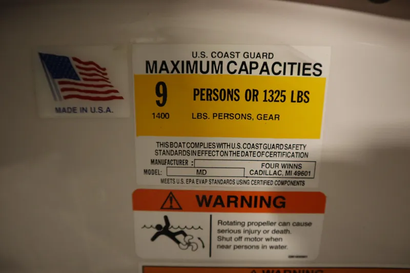 Slide: The Image of 2018 Four Winns H190 capacity label, U.S. Coast Guard certified, 9 persons or 1325 lbs. - 25