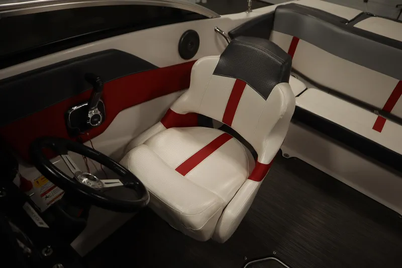 Slide: The Image of 2018 Four Winns H190 boat interior with steering wheel and stylish seating. - 26
