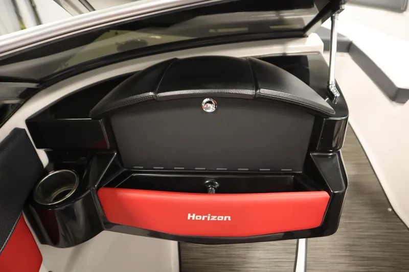 Slide: The Image of Interior of 2018 Four Winns H190 boat, featuring a Horizon glove compartment. - 29