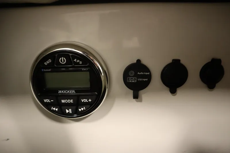Slide: The Image of Kicker audio system with USB and audio input on 2018 Four Winns H190 boat. - 30