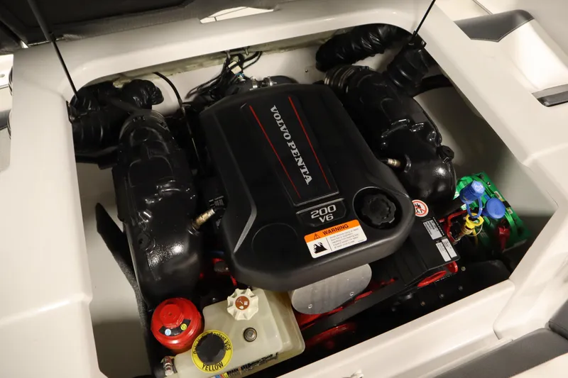 Slide: The Image of Engine compartment of a 2018 Four Winns H190 boat with Volvo Penta 200 V6 engine. - 37