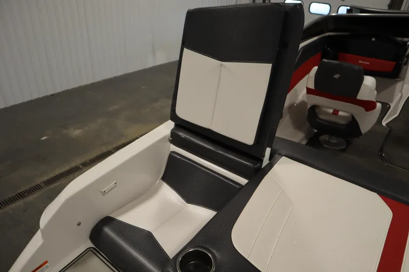 Slide: The Image of 2018 Four Winns H190 boat interior with black and white seating. - 40