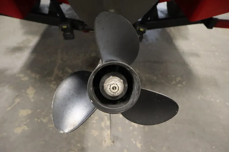 Slide: The Image of Close-up of a 2018 Four Winns H190 boat propeller on a concrete floor. - 45