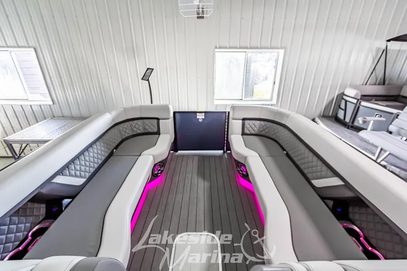 Slide: The Image of Luxurious 2025 Godfrey AquaPatio 255 SBC interior with modern seating and ambient lighting. - 22