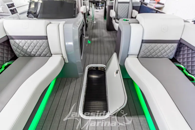 Slide: The Image of Luxurious interior of 2025 Godfrey AquaPatio 255 SBC pontoon boat with modern seating. - 29