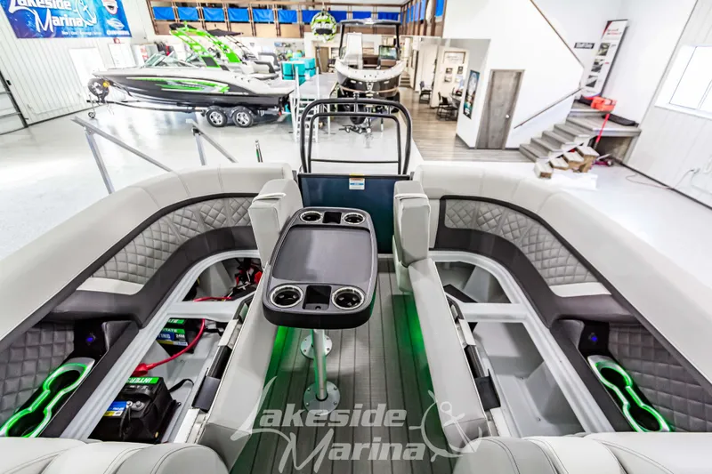 Slide: The Image of 2025 Godfrey AquaPatio 255 SBC boat interior at Lakeside Marina showroom. - 43